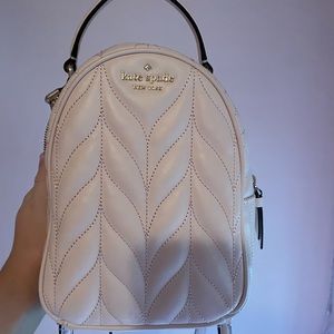 Kate Spade light pink Briar Lane quilted mini convertible backpack